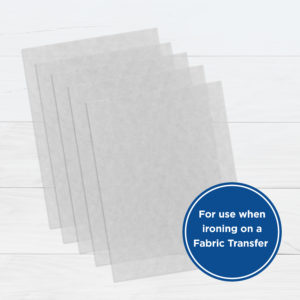image of parchment paper sheets that states - for use when ironing on a fabric transfer