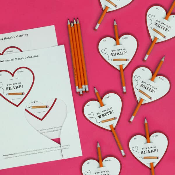 Free printable download of heart shaped valentine that holds pencil for classroom and students